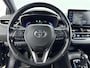 Toyota Corolla Touring Sports 1.8 HYBRID FIRST EDITION | TREKHAAK | CLIMA | CRUISE ADAPTIEF | CAMERA | NAVI | PRIVACY GLASS | 17'' LM VELGEN | STUUR- & STOELVERWARMING |