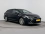 Toyota Corolla Touring Sports 1.8 HYBRID FIRST EDITION | TREKHAAK | CLIMA | CRUISE ADAPTIEF | CAMERA | NAVI | PRIVACY GLASS | 17'' LM VELGEN | STUUR- & STOELVERWARMING |
