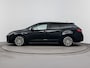 Toyota Corolla Touring Sports 1.8 HYBRID FIRST EDITION | TREKHAAK | CLIMA | CRUISE ADAPTIEF | CAMERA | NAVI | PRIVACY GLASS | 17'' LM VELGEN | STUUR- & STOELVERWARMING |