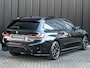 BMW 3-Serie Touring 330e xDrive M sport | Accu 19,5kWh | Trekhaak | Panorama dak  | Active Cruise | Camera  | Ambiance interieur