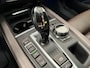 BMW X5 xDrive40e iPerformance High Executive Panoramadak Trekhaak Navigatie Apple Carplay Android Auto 360 camera Adaptive Cruise Control Stoelverwarming voor en achter Head-up-display Harman Kardon Dodehoek detectie Leder Climate Control parkeersensoren