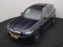 BMW X5 xDrive50e M Sport PHEV 490pk Dealer O.H. | Panodak Sky Lounge | Luchtvering | Head Up | 360 Camera | Harman / Kardon | Nappa Lederen Comfortstoelen Memory & Verwarmd | Carbon Schwarz | Apple Carplay | Keyless | Blis | 22"L.M | Plug In Hybrid |