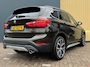 BMW X1 (f48) sDrive20i 192pk Orange Edition III 1e Eigenaar| Dealer Onderhouden | NL Auto | Trekhaak | Pano | Camera | Stoel/Stuurverwarming |
