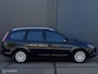 Ford Focus Wagon 1.8 Titanium Flexi Fuel - ECC - NAVI - CRUISE CONTROLE - TREKHAAK - PARKEERSENSOREN - BLUETOOTH - VERWARMDE VOORRUIT - LM VELGEN - NL AUTO - NAP - NIEUWE APK BIJ AFLEVERING -