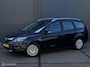 Ford Focus Wagon 1.8 Titanium Flexi Fuel - ECC - NAVI - CRUISE CONTROLE - TREKHAAK - PARKEERSENSOREN - BLUETOOTH - VERWARMDE VOORRUIT - LM VELGEN - NL AUTO - NAP - NIEUWE APK BIJ AFLEVERING -