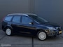 Ford Focus Wagon 1.8 Titanium Flexi Fuel - ECC - NAVI - CRUISE CONTROLE - TREKHAAK - PARKEERSENSOREN - BLUETOOTH - VERWARMDE VOORRUIT - LM VELGEN - NL AUTO - NAP - NIEUWE APK BIJ AFLEVERING -