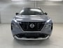 Nissan X-Trail 1.5 e-4orce Tekna 4WD 5p / 1800 KG Trekgewicht / Lederen Bekleding / Memoryseats / Navigatie / 360 Graden Camera / Stoel- en Stuurverwarming / Achterbankverwarming / Verwarmde Voorruit / Adaptive Cruise Control / Digitale Binnenspiegel / Climate Control /