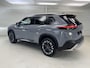 Nissan X-Trail 1.5 e-4orce Tekna 4WD 5p / 1800 KG Trekgewicht / Lederen Bekleding / Memoryseats / Navigatie / 360 Graden Camera / Stoel- en Stuurverwarming / Achterbankverwarming / Verwarmde Voorruit / Adaptive Cruise Control / Digitale Binnenspiegel / Climate Control /