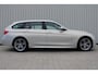 BMW 3-Serie Touring 316i High Executive | Incl. 12 maanden garantie | Cruise control | Climate control | Memory seat | Stoelverwarming | Navigatie | Lederen bekleding |