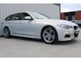 BMW 3-Serie Touring 316i High Executive | Incl. 12 maanden garantie | Cruise control | Climate control | Memory seat | Stoelverwarming | Navigatie | Lederen bekleding |