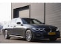 BMW 3-Serie 330e M-SPORT SCHUIFDAK, INDIVIDUAL LEDER, LASER, HUD, HARMAN/KARDON, ADAPT. CRUISE, SPORTSTOELEN, DRAVIT GRAU