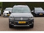 Volkswagen Tiguan 2.0 TSI Sport&Style 4Motion / Trekhaak / Android Auto / Parkeerhulp V+A / 17'' / Xenon / DAB / Navigatie / Stoelverwarming / Cruise Control