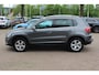 Volkswagen Tiguan 2.0 TSI Sport&Style 4Motion / Trekhaak / Android Auto / Parkeerhulp V+A / 17'' / Xenon / DAB / Navigatie / Stoelverwarming / Cruise Control