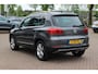 Volkswagen Tiguan 2.0 TSI Sport&Style 4Motion / Trekhaak / Android Auto / Parkeerhulp V+A / 17'' / Xenon / DAB / Navigatie / Stoelverwarming / Cruise Control