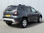 Dacia Duster 1.2 TCe Comfort / Trekhaak 1.500 KG / Airco / Cruise Control / Bluetooth / Elek. Ramen Voor + Achter / Lichtsensor /