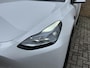 Tesla Model Y Long Range AWD 75 kWh | 92% SOH | Panoramadak | Lederen bekleding | Autopilot | Navigatie | Camera | Elektrische achterklep | LED | DAB | Keyless | 20 inch velgen | Stoel&stuurverwarming | Warmtepomp