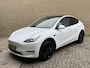 Tesla Model Y Long Range AWD 75 kWh | 92% SOH | Panoramadak | Lederen bekleding | Autopilot | Navigatie | Camera | Elektrische achterklep | LED | DAB | Keyless | 20 inch velgen | Stoel&stuurverwarming | Warmtepomp