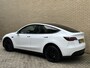 Tesla Model Y Long Range AWD 75 kWh | 92% SOH | Panoramadak | Lederen bekleding | Autopilot | Navigatie | Camera | Elektrische achterklep | LED | DAB | Keyless | 20 inch velgen | Stoel&stuurverwarming | Warmtepomp