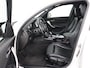 BMW 1-Serie M140i High Executive | Stoelverwarming | Carplay | Leder | Adaptief LED | Keyless | Navigatie | Sportstoelen | Parkeerhulp | Climate control | Cruise control | Bluetooth | Getint glas | M Sport