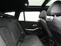 BMW 3-Serie Touring 330e M Sport PHEV 293pk Dealer O.H. | Dravitgrau | Trekhaak Af Fabriek | Panodak | Head Up | Camera | Lederen Sportstoelen Verwarmd | Sfeerverlichting | Apple Carplay | Keyless | Blis | Cruise Control | Navigatie | DAB | Plug I