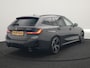 BMW 3-Serie Touring 330e M Sport PHEV 293pk Dealer O.H. | Dravitgrau | Trekhaak Af Fabriek | Panodak | Head Up | Camera | Lederen Sportstoelen Verwarmd | Sfeerverlichting | Apple Carplay | Keyless | Blis | Cruise Control | Navigatie | DAB | Plug I