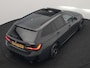 BMW 3-Serie Touring 330e M Sport PHEV 293pk Dealer O.H. | Dravitgrau | Trekhaak Af Fabriek | Panodak | Head Up | Camera | Lederen Sportstoelen Verwarmd | Sfeerverlichting | Apple Carplay | Keyless | Blis | Cruise Control | Navigatie | DAB | Plug I
