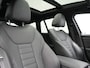 BMW 3-Serie Touring 330e M Sport PHEV 293pk Dealer O.H. | Dravitgrau | Trekhaak Af Fabriek | Panodak | Head Up | Camera | Lederen Sportstoelen Verwarmd | Sfeerverlichting | Apple Carplay | Keyless | Blis | Cruise Control | Navigatie | DAB | Plug I