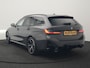 BMW 3-Serie Touring 330e M Sport PHEV 293pk Dealer O.H. | Dravitgrau | Trekhaak Af Fabriek | Panodak | Head Up | Camera | Lederen Sportstoelen Verwarmd | Sfeerverlichting | Apple Carplay | Keyless | Blis | Cruise Control | Navigatie | DAB | Plug I