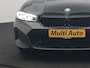 BMW 3-Serie Touring 330e M Sport PHEV 293pk Dealer O.H. | Dravitgrau | Trekhaak Af Fabriek | Panodak | Head Up | Camera | Lederen Sportstoelen Verwarmd | Sfeerverlichting | Apple Carplay | Keyless | Blis | Cruise Control | Navigatie | DAB | Plug I