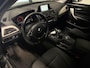 BMW 1-Serie 116i Essential (LED, CRUISE CONTROL, NAVI, PARKEERSENSOREN)