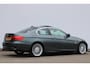 BMW 3-Serie 320i Coupé | schuifkanteldak | leder sport | navigatie | achteruitrijcamera | Alpina velgen | 170 PK