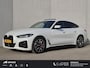 BMW i4 eDrive35 M Sport Edition 70 kWh / SOH 100% / CCS Snel Lader / Panoramadak / Lederen Bekleding / Adaptief Cruise Control / Dealer Onderhouden / Wide Screen Display / Stoelverwarming / Trekgewicht 1600 kg / Apple Carplay Android Auto /