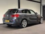 BMW 1-Serie 118i Centennial High Executive (M-SPORT, LED, LEDER, NAVI, STOELVERWARMING)