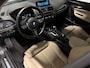 BMW 1-Serie 118i Centennial High Executive (M-SPORT, LED, LEDER, NAVI, STOELVERWARMING)