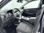Hyundai Kona Electric EV FASHION 64 kWh | DODEHOEK DETECTIE | PDC | 3 FASEN | WARMTEPOMP | CAMERA | CLIMA | CRUISE ADAPT. | NAVI | PRIVACY GLASS | DAKRAILING | APPLE CAR PLAY & ADROID AUTO |