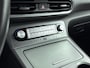 Hyundai Kona Electric EV FASHION 64 kWh | DODEHOEK DETECTIE | PDC | 3 FASEN | WARMTEPOMP | CAMERA | CLIMA | CRUISE ADAPT. | NAVI | PRIVACY GLASS | DAKRAILING | APPLE CAR PLAY & ADROID AUTO |