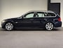 BMW 3-Serie Touring 325i High Executive (CRUISE CONTROL, NAVI, LEDER, PARKEERSENSOREN, GOED ONDERHOUDEN)