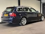 BMW 3-Serie Touring 325i High Executive (CRUISE CONTROL, NAVI, LEDER, PARKEERSENSOREN, GOED ONDERHOUDEN)