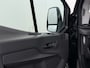 Ford Transit 310 2.0 TDCI L2H2 3-Persoons Camera Airco Stoelverwarming Elek.Stoel Cruise Control Pdc Lane Assist Trend Betonplex Vloer Wandbetimmering Schuifdeur Voorruitverwarming 1e Eigenaar Origineel Nederlandse Bus