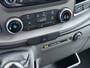 Ford Transit 310 2.0 TDCI L2H2 3-Persoons Camera Airco Stoelverwarming Elek.Stoel Cruise Control Pdc Lane Assist Trend Betonplex Vloer Wandbetimmering Schuifdeur Voorruitverwarming 1e Eigenaar Origineel Nederlandse Bus