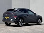 Hyundai Kona 1.6 GDI HEV Comfort Smart / Automaat / 1.300 kg trekgewicht / Elektrische klep / Navigatie / Camera / Adaptieve CC / Apple Carplay Android / Stuur- & stoelverwarming / 18" LM wielen /
