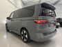 Volkswagen Multivan 1.4 eHybrid L2 BULLI EDITION 7p. PURE-GREY/TREKHAAK/19"/CAMERA/SOH 97%/ACC/STANDKACHEL/CARPLAY/NAVI/ELECTR.A.KLEP/PRIVACY/SCHUIFRUITJES/VOLLEDIG VW DEALER HISTORIE