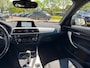 BMW 1-Serie 118I High Executive Stoelverwarming Navi Cruisecontrol Automaat PDC