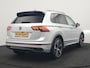 Volkswagen Tiguan 1.4 TSI eHybrid R-Line PHEV 245pk Dealer O.H | Trekhaak Af Fabriek | Adaptive Cruise | IQ Light | Adaptive Onderstel | Camera | Alcantara Sportstoelen & Stuur Verwarmd | Blis | Keyless | Sfeerverlichting | Virtual | Navigatie | DAB | 20"L.M | Plug In Hybrid |