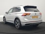 Volkswagen Tiguan 1.4 TSI eHybrid R-Line PHEV 245pk Dealer O.H | Trekhaak Af Fabriek | Adaptive Cruise | IQ Light | Adaptive Onderstel | Camera | Alcantara Sportstoelen & Stuur Verwarmd | Blis | Keyless | Sfeerverlichting | Virtual | Navigatie | DAB | 20"L.M | Plug In Hybrid |