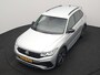 Volkswagen Tiguan 1.4 TSI eHybrid R-Line PHEV 245pk Dealer O.H | Trekhaak Af Fabriek | Adaptive Cruise | IQ Light | Adaptive Onderstel | Camera | Alcantara Sportstoelen & Stuur Verwarmd | Blis | Keyless | Sfeerverlichting | Virtual | Navigatie | DAB | 20"L.M | Plug In Hybrid |