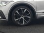 Volkswagen Tiguan 1.4 TSI eHybrid R-Line PHEV 245pk Dealer O.H | Trekhaak Af Fabriek | Adaptive Cruise | IQ Light | Adaptive Onderstel | Camera | Alcantara Sportstoelen & Stuur Verwarmd | Blis | Keyless | Sfeerverlichting | Virtual | Navigatie | DAB | 20"L.M | Plug In Hybrid |