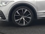 Volkswagen Tiguan 1.4 TSI eHybrid R-Line PHEV 245pk Dealer O.H | Trekhaak Af Fabriek | Adaptive Cruise | IQ Light | Adaptive Onderstel | Camera | Alcantara Sportstoelen & Stuur Verwarmd | Blis | Keyless | Sfeerverlichting | Virtual | Navigatie | DAB | 20"L.M | Plug In Hybrid |