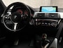 BMW 3-Serie 320i M Sport High Executive 184Pk Automaat (GROOT NAVI, M PAKKET, LEDER, STOELVERWARMING, SPORTSTOELEN, PARKEERSENSOREN, GETINT GLAS, SPORT AUTOMAAT, NIEUWSTAAT)
