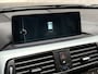 BMW 3-Serie 320i M Sport High Executive 184Pk Automaat (GROOT NAVI, M PAKKET, LEDER, STOELVERWARMING, SPORTSTOELEN, PARKEERSENSOREN, GETINT GLAS, SPORT AUTOMAAT, NIEUWSTAAT)